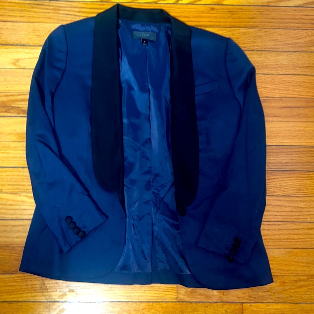 Blue and black women suit from J-Crew. I’m very good condition woke once. Size 2